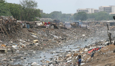 A city river heavily polluted with waste